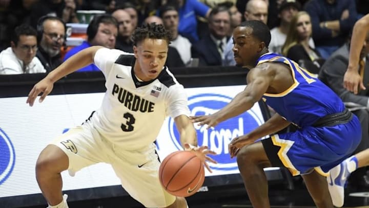 Nov 11, 2016; West Lafayette, IN, USA; Purdue Boilermakers guard Carsen Edwards (3) steals the ball from McNeese State Cowboys guard Kalob Ledoux (11) in the second half at Mackey Arena. Purdue won the game 109-65. Edwards scored 18 points in his first regular season game. Mandatory Credit: Sandra Dukes-USA TODAY Sports