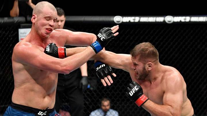 HAMBURG, GERMANY - JULY 22: (R-L) Marcin Tybura of Poland punches Stefan Struve of The Netherlands in their heavyweight bout during the UFC Fight Night at Barclaycard Arena on July 22, 2018 in Hamburg, Germany. (Photo by Jeff Bottari/Zuffa LLC/Zuffa LLC via Getty Images)