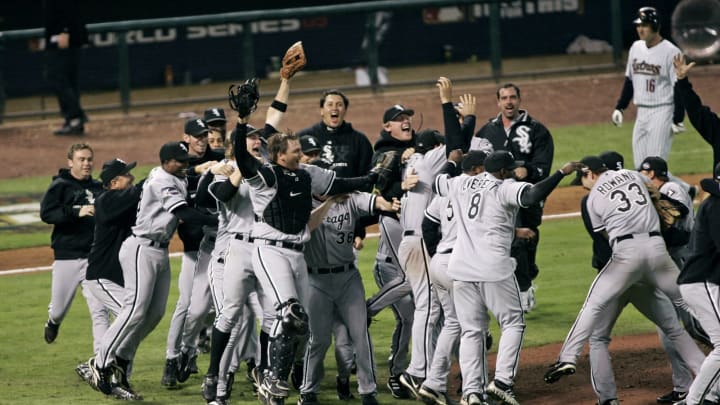 Members of the Chicago White Sox celebrate on the field after winning the 2005 World Series with a 1-0 win over the Houston Astro’s at Minute Maid Park in Houston, Texas on October 26, 2006. The White Sox swept the series 4 games to none. (Photo by G. N. Lowrance/Getty Images)
