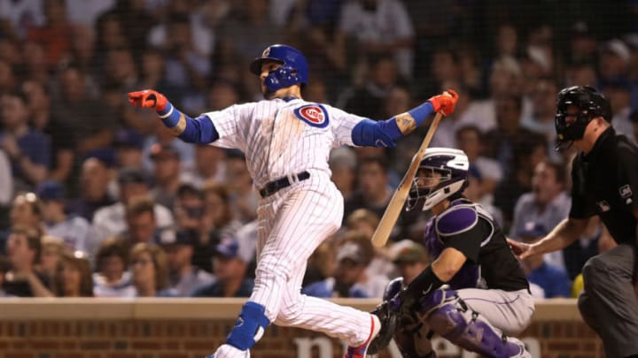 The Chicago Cubs' Javier Baez hits a two-run home rum in the sixth inning against the Colorado Rockies at Wrigley Field in Chicago on Tuesday, June 4, 2019. The Cubs won, 6-3. (Chris Sweda/Chicago Tribune/TNS via Getty Images)