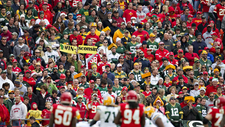Fans of the Green Bay Packers support their team during a game against the Kansas City Chiefs (Photo by Wesley Hitt/Getty Images)
