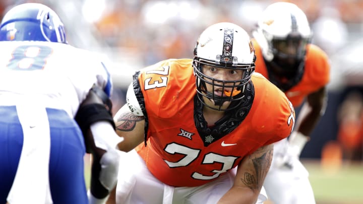 STILLWATER, OK – SEPTEMBER 15: Offensive lineman Teven Jenkins #73 of the Oklahoma State Cowboys looks at the Boise State Broncos defensive line at Boone Pickens Stadium on September 15, 2018 in Stillwater, Oklahoma. The Cowboys defeated the Broncos 44-21. (Photo by Brett Deering/Getty Images)