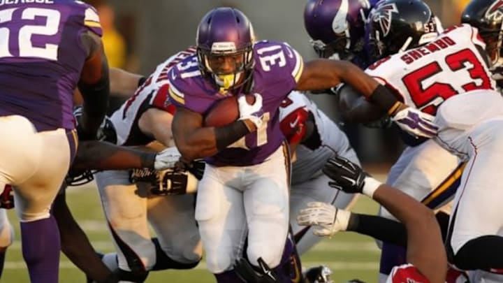 Sep 28, 2014; Minneapolis, MN, USA; Minnesota Vikings running back Jerick McKinnon (31) rushes against the Atlanta Falcons in the fourth quarter at TCF Bank Stadium. The Vikings win 41-28. Mandatory Credit: Bruce Kluckhohn-USA TODAY Sports