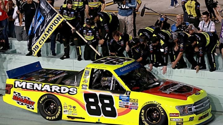 HOMESTEAD, FLORIDA - NOVEMBER 15: Matt Crafton, driver of the #88 Jack Links/Menards Ford, and crew celebrate after winning the NASCAR Gander Outdoors Truck Series Ford EcoBoost 200 at Homestead-Miami Speedway on November 15, 2019 in Homestead, Florida. (Photo by Sean Gardner/Getty Images)