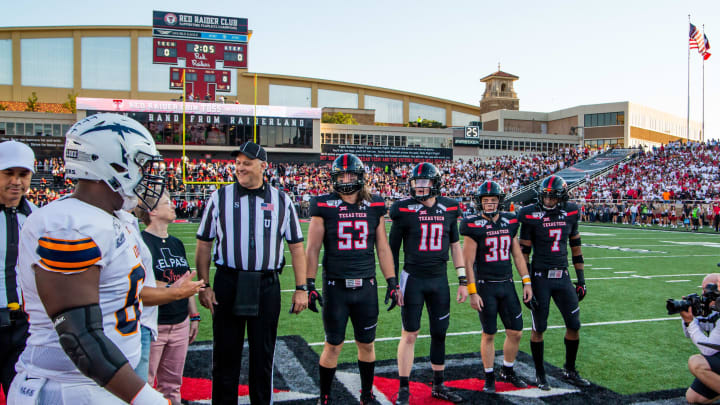 Texas Tech captains including defensive lineman Eli Howard #53, quarterback Alan Bowman #10, running back Jax Welch #30, and defensive back Adrian Frye #7 (Photo by John E. Moore III/Getty Images)