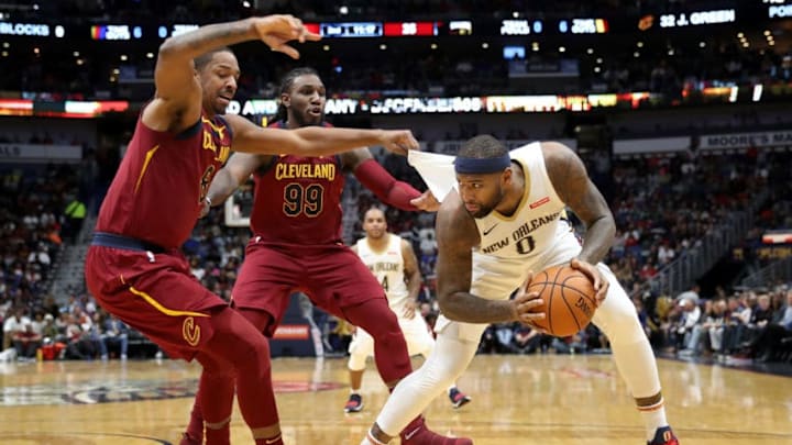 =NEW ORLEANS, LA - OCTOBER 28: DeMarcus Cousins #0 of the New Orleans Pelicans is fouled by Kevin Love #0 of the Cleveland Cavaliers at the Smoothie King Center on October 28, 2017 in New Orleans, Louisiana. NOTE TO USER: User expressly acknowledges and agrees that, by downloading and or using this photograph, User is consenting to the terms and conditions of the Getty Images License Agreement. (Photo by Chris Graythen/Getty Images)