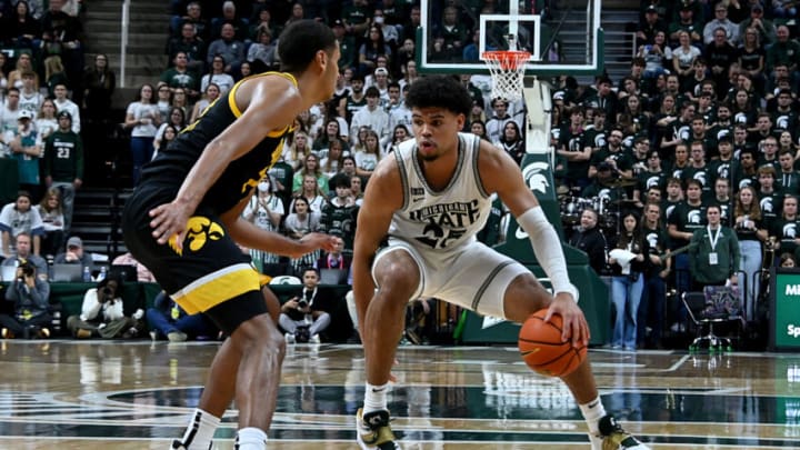 Jan 26, 2023; East Lansing, Michigan, USA; Michigan State Spartans forward Malik Hall (25) moves against Iowa Hawkeyes forward Kris Murray (24) in the second half at Jack Breslin Student Events Center. Mandatory Credit: Dale Young-USA TODAY Sports