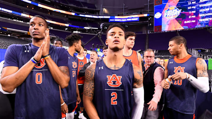 MINNEAPOLIS, MINNESOTA - APRIL 05: Horace Spencer #0, Bryce Brown #2 and Samir Doughty #10 of the Auburn Tigers wait to enter the court to start practice ahead of the Men's Final Four at U.S. Bank Stadium on April 05, 2019 in Minneapolis, Minnesota. (Photo by Brett Wilhelm/NCAA Photos via Getty Images )