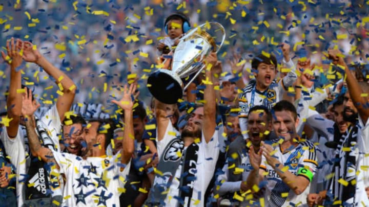 LOS ANGELES, CA – DECEMBER 07: Landon Donovan of the Los Angeles Galaxy lifts the Phillip F. Anschutz Trophy after the Galaxy defeated the New England Revolution during the 2014 MLS Cup match at the at StubHub Center on December 7, 2014, in Los Angeles, California. (Photo by Robert Laberge/Getty Images)