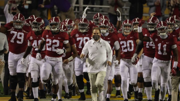 Alabama Crimson Tide head coach Nick Saban runs onto the field with his team prior to kickoff against the LSU Tigers at Tiger Stadium. Mandatory Credit: Derick E. Hingle-USA TODAY Sports