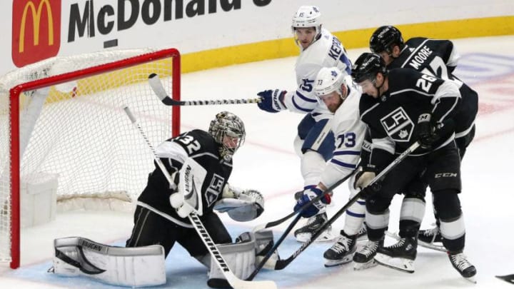 Kyle Clifford #73 of the Toronto Maple Leafs skates against Sean Walker #26 and Jonathan Quick #32 of the Los Angeles Kings during the second period at Staples Center. (Photo by Katelyn Mulcahy/Getty Images)