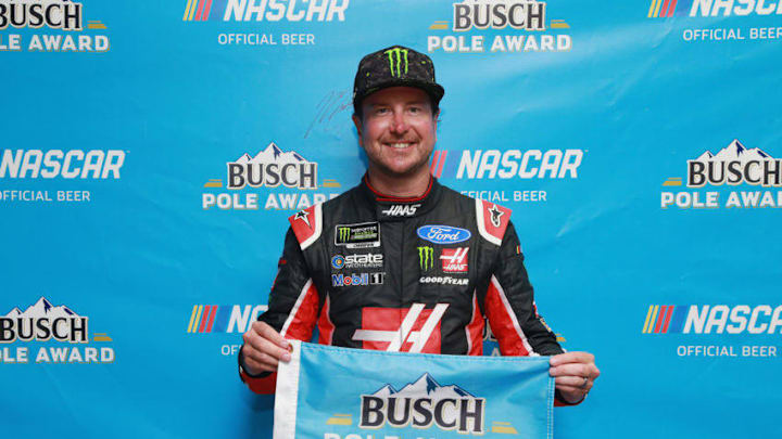 FORT WORTH, TX - APRIL 06: Kurt Busch, driver of the #41 Haas Automation/Monster Energy Ford, poses with the Busch Pole Award after qualifying on the pole for the Monster Energy NASCAR Cup Series O'Reilly Auto Parts 500 at Texas Motor Speedway on April 6, 2018 in Fort Worth, Texas. (Photo by Sean Gardner/Getty Images)