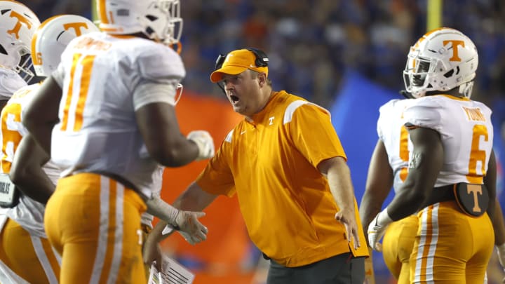 Sep 25, 2021; Gainesville, Florida, USA; Tennessee Volunteers head coach Josh Heupel reacts with teammates against the Florida Gators during the third quarter at Ben Hill Griffin Stadium. Mandatory Credit: Kim Klement-USA TODAY Sports
