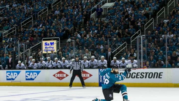 Apr 18, 2016; San Jose, CA, USA; San Jose Sharks defenseman Brent Burns (88) shoots against the Los Angeles Kings in the third period of game three in the first round of the 2016 Stanley Cup Playoffs at SAP Center at San Jose. The Kings won 2-1 in overtime. Mandatory Credit: John Hefti-USA TODAY Sports