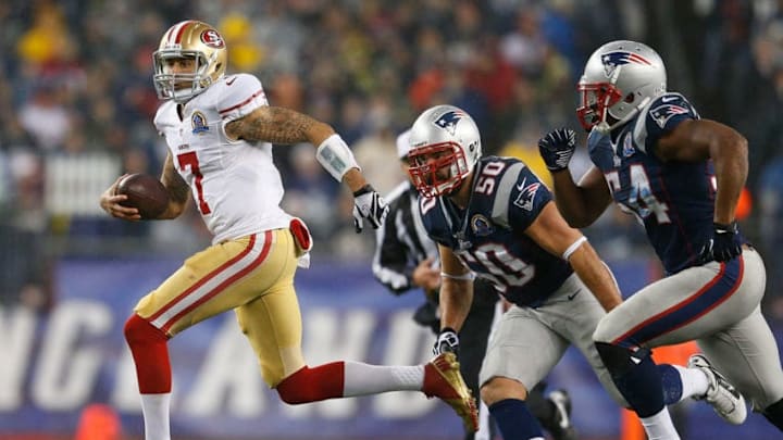 FOXBORO, MA - DECEMBER 16: Colin Kaepernick #7 of the San Francisco 49ers runs the ball against the New England Patriots in the second quarter at Gillette Stadium on December 16, 2012 in Foxboro, Massachusetts. (Photo by Jim Rogash/Getty Images)