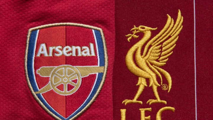 MANCHESTER, ENGLAND - MAY 04: The Liverpool and Arsenal club crests on their first team home shirts on May 4, 2020 in Manchester, England (Photo by Visionhaus)