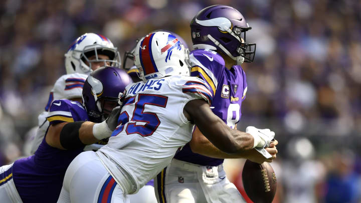 MINNEAPOLIS, MN – SEPTEMBER 23: Jerry Hughes #55 of the Buffalo Bills strips the ball out of the hands of Kirk Cousins #8 of the Minnesota Vikings in the first quarter of the game at U.S. Bank Stadium on September 23, 2018 in Minneapolis, Minnesota. (Photo by Hannah Foslien/Getty Images)