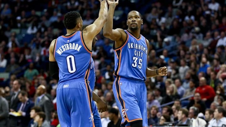 Feb 25, 2016; New Orleans, LA, USA; Oklahoma City Thunder forward Kevin Durant (35) celebrates with guard Russell Westbrook (0) after scoring against the New Orleans Pelicans during the fourth quarter of a game at Smoothie King Center. The Pelicans defeated the Thunder 123-119. Mandatory Credit: Derick E. Hingle-USA TODAY Sports