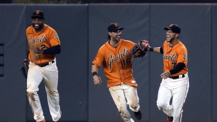 Jun 24, 2016; San Francisco, CA, USA; San Francisco Giants center fielder Denard Span (2), right fielder Gregor Blanco (7) and left fielder Angel Pagan (16) celebrate in the outfield at the end of the game against the Philadelphia Phillies at AT&T Park the San Francisco Giants defeat the Philadelphia Phillies 5 to 4. Mandatory Credit: Neville E. Guard-USA TODAY Sports