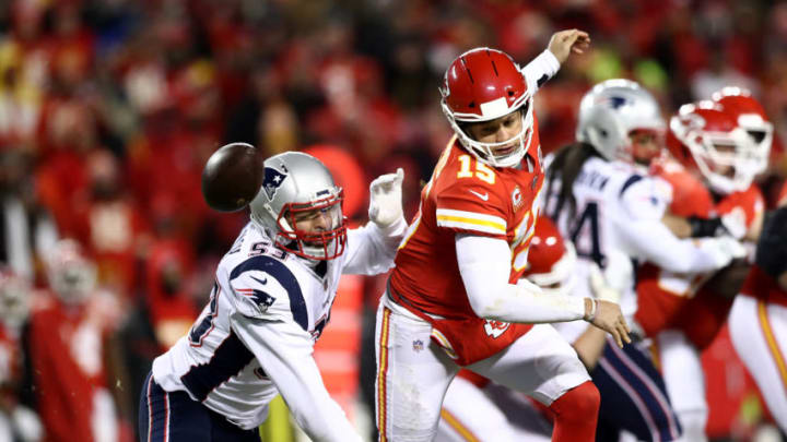 KANSAS CITY, MISSOURI - JANUARY 20: Patrick Mahomes #15 of the Kansas City Chiefs fumbles the ball as he is hit by Kyle Van Noy #53 of the New England Patriots in the second quarter during the AFC Championship Game at Arrowhead Stadium on January 20, 2019 in Kansas City, Missouri. (Photo by Ronald Martinez/Getty Images)