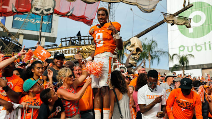 TAMPA, FL - JANUARY 1: Justin Martin #8 of the Tennessee Volunteers joins fans to celebrate a win over the Northwestern Wildcats in the Outback Bowl at Raymond James Stadium on January 1, 2016 in Tampa, Florida. (Photo by Mike Carlson/Getty Images)