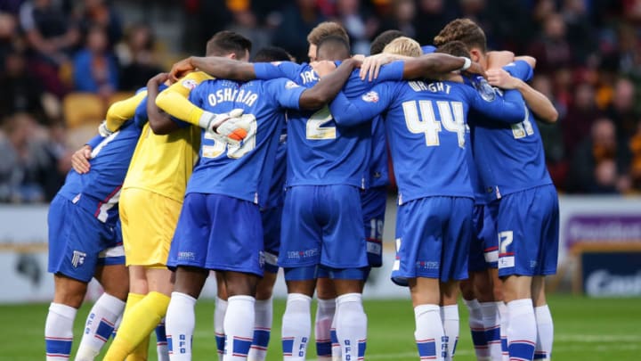 BRADFORD, ENGLAND - AUGUST 18: Gillingham FC huddle priort to the start of the Sky Bet League One match between Bradford City AFC and Gillingham FC at Coral Windows Stadium, Valley Parade on August 18, 2015 in Bradford, England. (Photo by Daniel L Smith/Getty Images)