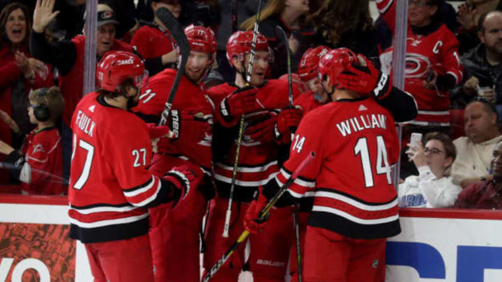 RALEIGH, NC – MARCH 28: Warren Foegele #13 of the Carolina Hurricanes celebrates with teammates Justin Williams #14, Justin Faulk #27, Jordan Staal #11 and Brett Pesce #22 after scoring a goal of during an NHL game against the Washington Capitals on March 28, 2019 at PNC Arena in Raleigh, North Carolina. (Photo by Gregg Forwerck/NHLI via Getty Images)