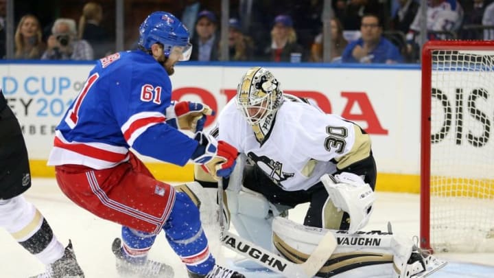 Apr 19, 2016; New York, NY, USA; Pittsburgh Penguins goalie Matt Murray (30) makes a save against New York Rangers left wing Rick Nash (61) during the second period of game three of the first round of the 2016 Stanley Cup Playoffs at Madison Square Garden. Mandatory Credit: Brad Penner-USA TODAY Sports