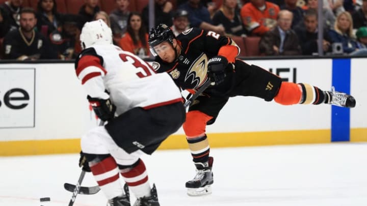 ANAHEIM, CA - SEPTEMBER 24: Brandon Montour #26 of the Anaheim Ducks shoots the puck past Robbie Russo #34 of the Arizona Coyotes during the first period of an NHL preseason game at Honda Center on September 24, 2018 in Anaheim, California. (Photo by Sean M. Haffey/Getty Images)