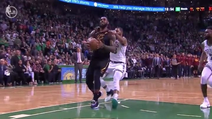 Remembering when LeBron James powered through a horse-collar grab from Marcus Morris to score this insane and-one layup. 