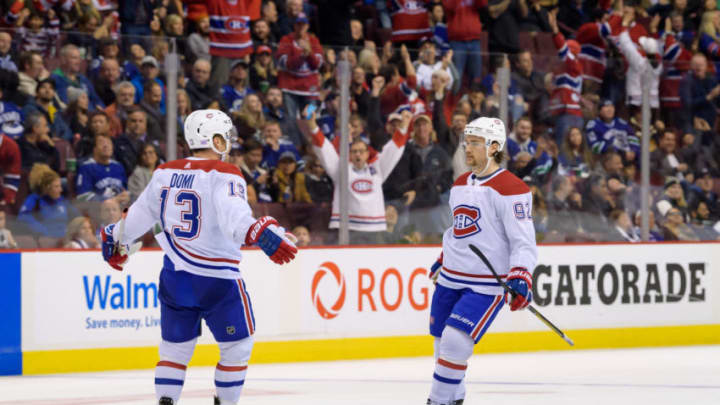 VANCOUVER, BC - NOVEMBER 17: Montreal Canadiens left Wing Jonathan Drouin (92) is congratulated by center Max Domi (13) after scoring a goal during their NHL game against the Vancouver Canucks at Rogers Arena on November 17, 2018 in Vancouver, British Columbia, Canada. Monreal won 3-2. (Photo by Derek Cain/Icon Sportswire via Getty Images)