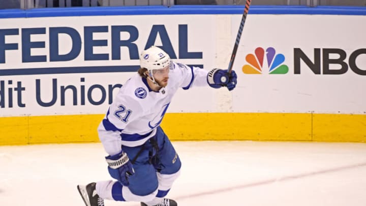 Aug 26, 2020; Toronto, Ontario, CAN; Tampa Bay Lightning center Brayden Point (21) celebrates scoring a goal against the Boston Bruins during the second period in game three of the second round of the 2020 Stanley Cup Playoffs at Scotiabank Arena. Mandatory Credit: Dan Hamilton-USA TODAY Sports