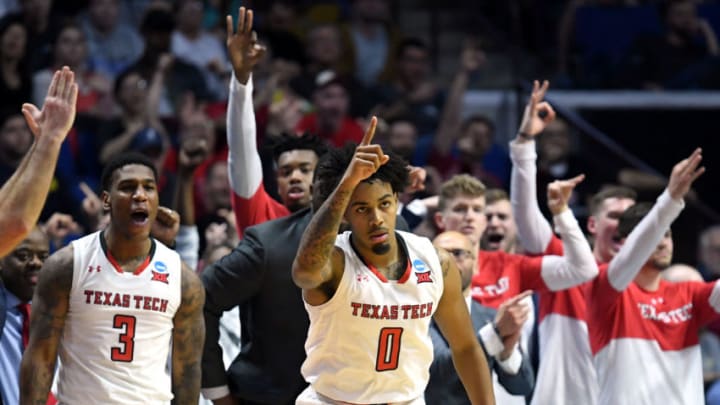 TULSA, OKLAHOMA - MARCH 24: Kyler Edwards #0 of the Texas Tech Red Raiders celebrates his three pointer against the Buffalo Bulls in front of his bench during the second half of the second round game of the 2019 NCAA Men's Basketball Tournament at BOK Center on March 24, 2019 in Tulsa, Oklahoma. (Photo by Harry How/Getty Images)