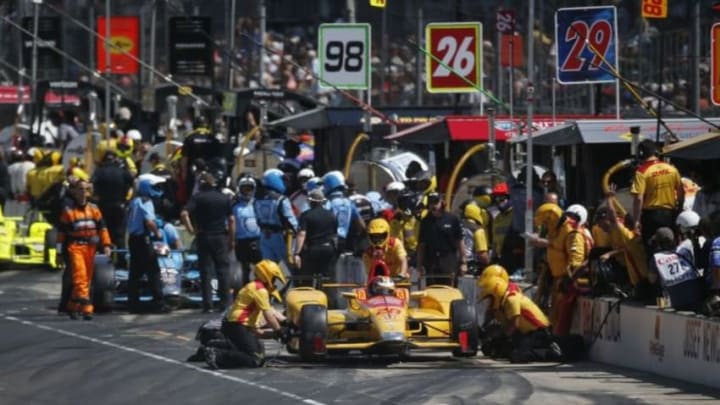 May 27, 2016; Indianapolis, IN, USA; Verizon Indy Car driver Ryan Hunter-Reay gets his car worked on in the pits during Carb Day for the Indianapolis 500 at Indianapolis Motor Speedway. Mandatory Credit: Brian Spurlock-USA TODAY Sports