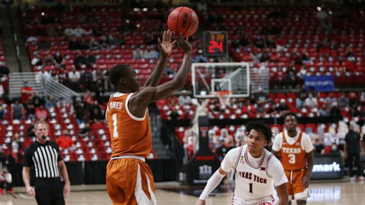 Feb 27, 2021; Lubbock, Texas, USA; Texas Longhorns guard Andrew Jones (1) takes a shot against Texas Tech Red Raiders guard Terrence Shannon Jr. (1) in the second half at United Supermarkets Arena. Mandatory Credit: Michael C. Johnson-USA TODAY Sports