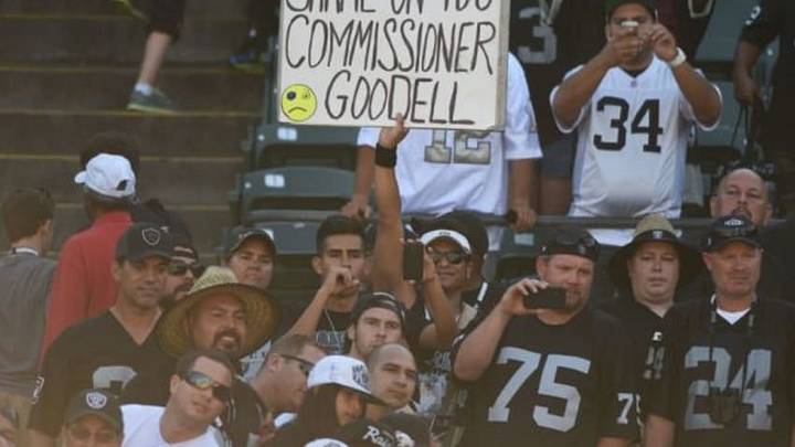 September 14, 2014; Oakland, CA, USA; An Oakland Raiders fan holds a sign for NFL commissioner Roger Goodell after the game against the Houston Texans at O.co Coliseum. The Texans defeated the Raiders 30-14. Mandatory Credit: Kyle Terada-USA TODAY Sports
