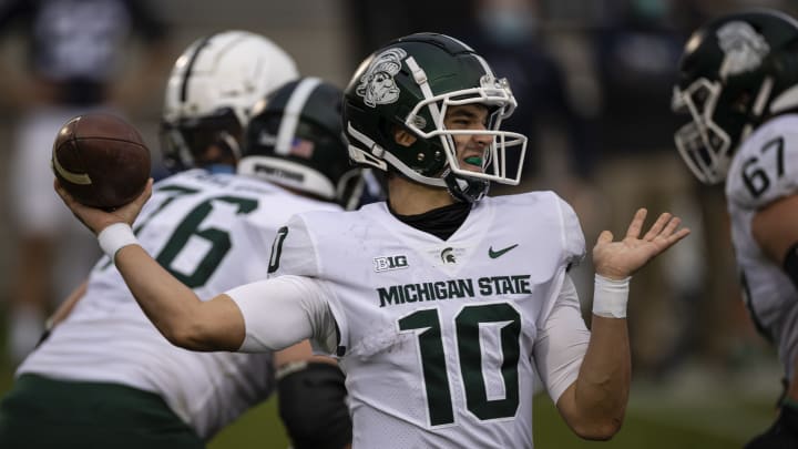 STATE COLLEGE, PA – DECEMBER 12: Payton Thorne #10 of the Michigan State Spartans attempts a pass against the Penn State Nittany Lions during the second half at Beaver Stadium on December 12, 2020 in State College, Pennsylvania. (Photo by Scott Taetsch/Getty Images)