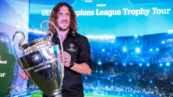 Carles Puyol holds the UEFA Cup trophy during UEFA Champions League Trophy Tour in Jakarta on March 11, 2019 in Jakarta, Indonesia. (Photo by Andrew Gal/NurPhoto via Getty Images)