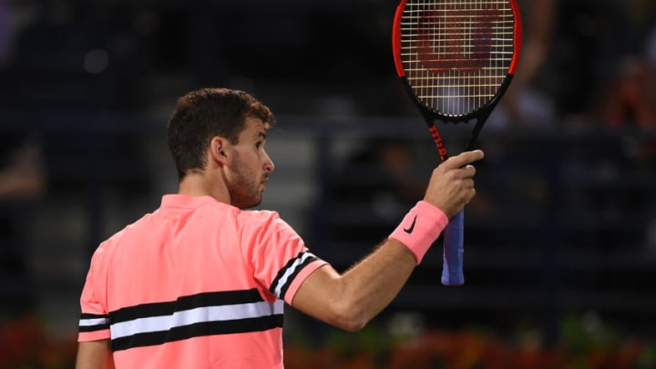 DUBAI, UNITED ARAB EMIRATES - FEBRUARY 27: Grigor Dimitrov of Bulgaria celebrates a point during his match against Malek Jaziri of Tunisia on day two of the ATP Dubai Duty Free Tennis Championships at the Dubai Duty Free Stadium on February 27, 2018 in Dubai, United Arab Emirates. (Photo by Tom Dulat/Getty Images)