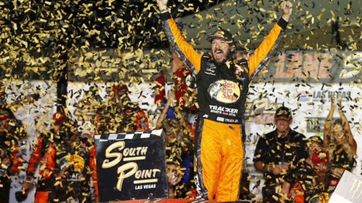 LAS VEGAS, NEVADA - SEPTEMBER 15: Martin Truex Jr., driver of the #19 Bass Pro Shops Toyota, celebrates in victory lane after winning the Monster Energy NASCAR Cup Series South Point 400 at Las Vegas Motor Speedway on September 15, 2019 in Las Vegas, Nevada. (Photo by Jonathan Ferrey/Getty Images)