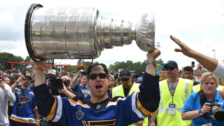 ST. LOUIS, MO - JUN 15: St. Louis Blues leftwing Jaden Schwartz (17) lifts the Stanley Cup during the St. Louis Blues victory parade held on June 15, 2019, in downtown, St. Louis, Mo. (Photo by Keith Gillett/Icon Sportswire via Getty Images)