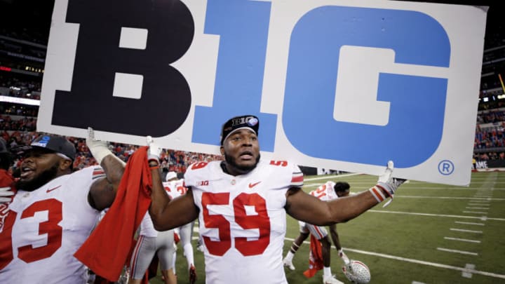 INDIANAPOLIS, IN - DECEMBER 02: Tyquan Lewis #59 of the Ohio State Buckeyes celebrates following a win against the Wisconsin Badgers in the Big Ten Championship at Lucas Oil Stadium on December 2, 2017 in Indianapolis, Indiana. (Photo by Joe Robbins/Getty Images)