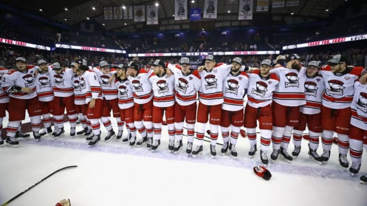 ROSEMONT, ILLINOIS - JUNE 08: Members of the Charlotte Checkers wait their turn to hoist the Calder Cup after game Five of the Calder Cup Finals at Allstate Arena on June 08, 2019 in Rosemont, Illinois. The Checkers defeated the Wolves 5-3 to win the Calder Cup. (Photo by Jonathan Daniel/Getty Images)