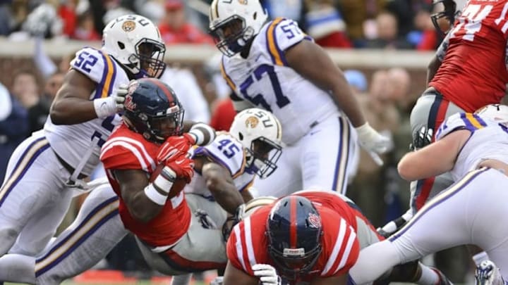Nov 21, 2015; Oxford, MS, USA; Mississippi Rebels running back Jaylen Walton (6) scores a touchdown during the second quarter of the game against the LSU Tigers at Vaught-Hemingway Stadium. Mississippi won 38-17. Mandatory Credit: Matt Bush-USA TODAY Sports