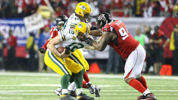 ATLANTA, GA - JANUARY 22: Atlanta Falcons defensive end Tyson Jackson (94) sacks Green Bay Packers quarterback Aaron Rodgers (12) during the second half of the NFC Championship Game game between the Green Bay Packers and the Atlanta Falcons on January 22, 2017, at the Georgia Dome in Atlanta, GA. The Atlanta Falcons claim the NFC Championship over the Green Bay Packers 44-21. (Photo by Frank Mattia/Icon Sportswire via Getty Images)