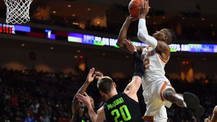LAS VEGAS, NEVADA - NOVEMBER 23: Kerwin Roach II #12 of the Texas Longhorns shoots against Joshua Langford #1 and Matt McQuaid #20 of the Michigan State Spartans during the championship game of the 2018 Continental Tire Las Vegas Invitational basketball tournament at the Orleans Arena on November 23, 2018 in Las Vegas, Nevada. (Photo by Sam Wasson/Getty Images)