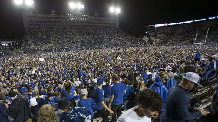 PROVO, UT – SEPTEMBER 11: Fans of the BYU Cougars rush the field after their upset win over the Utah Utes at LaVell Edwards Stadium on September 11, 2021 in Provo, Utah. (Photo by Chris Gardner/Getty Images)