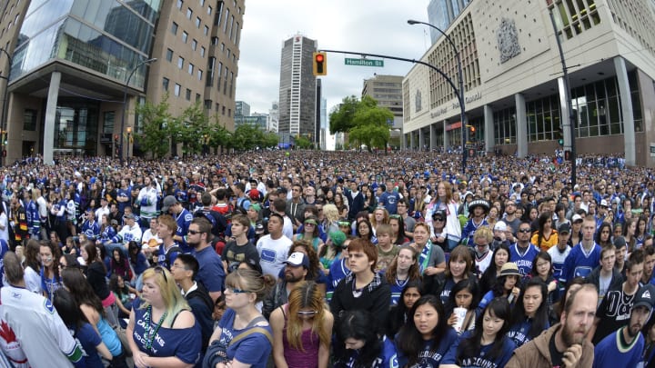 VANCOUVER, CANADA – JUNE 13: Vancouver Canucks fans gather at a view site to watch Game Six of the 2011 NHL Stanley Cup Playoffs on June 13, 2011 in downtown Vancouver, British Columbia, Canada. (Photo by Rich Lam/Getty Images)