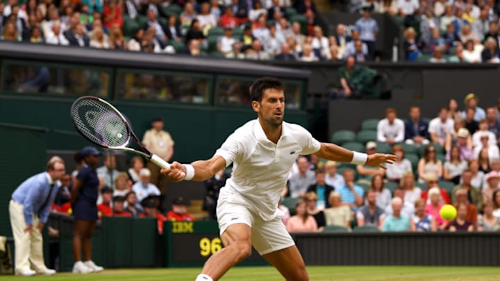 LONDON, ENGLAND - JULY 11: Novak Djokovic of Serbia plays a forehand during the Gentlemen's Singles fourth round match against Adrian Mannarino of France on day eight of the Wimbledon Lawn Tennis Championships at the All England Lawn Tennis and Croquet Club on July 11, 2017 in London, England. (Photo by Shaun Botterill/Getty Images)
