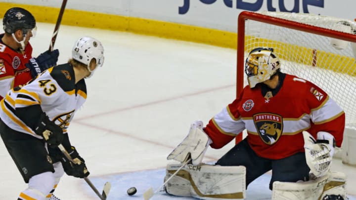 Florida Panthers goalie Roberto Luongo (1) stops a scoring attempt by Boston Bruins' Danton Heinen (43) on Tuesday, Dec. 4, 2018 at the BB&T Center in Sunrise, Fla. (Charles Trainor Jr./Miami Herald/TNS via Getty Images)